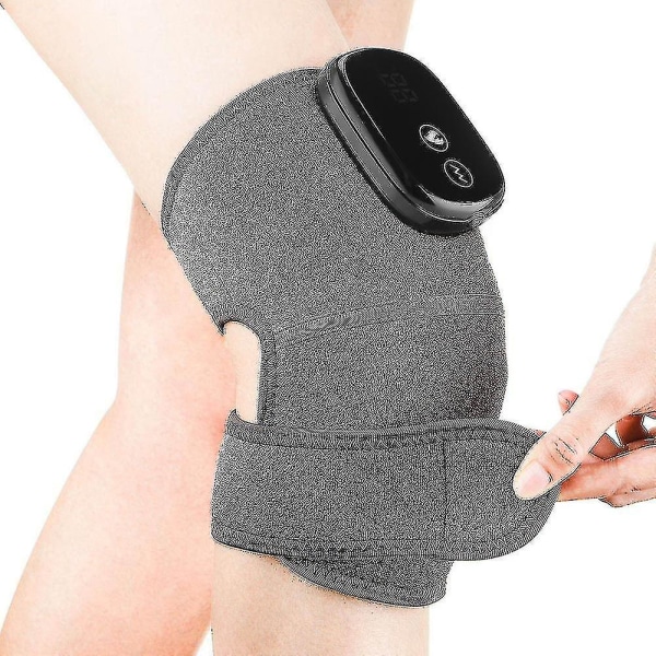 Opvarmet knæstøtte Knæmassager med varme til knævarm og massage Elektrisk knæbind
