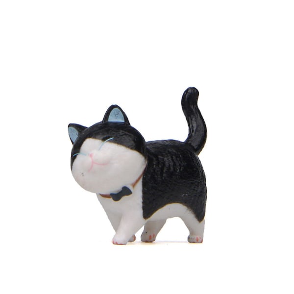 Cat Bell Doll,handgjord rund och ärlig Cat Healing Värmesystem,roterande tecknad kattdocka Leksak Desktopcake Dekor Barnpresent White-Black 1pc