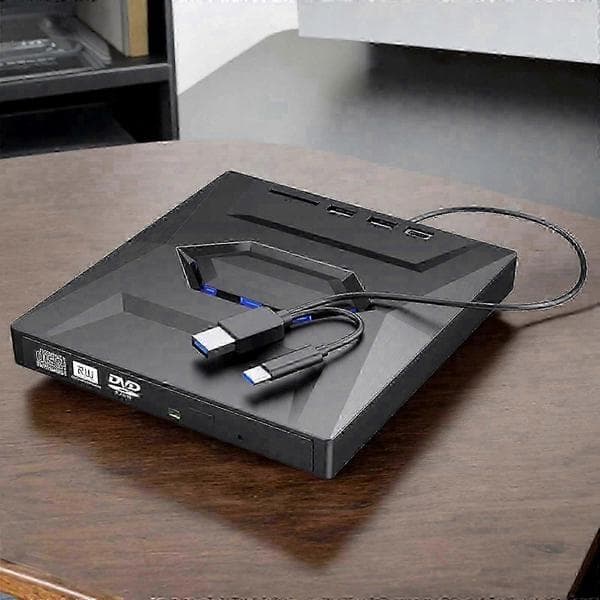 Bärbar MiniDisc-spelare med USB-inspelning och extern DVD-enhet