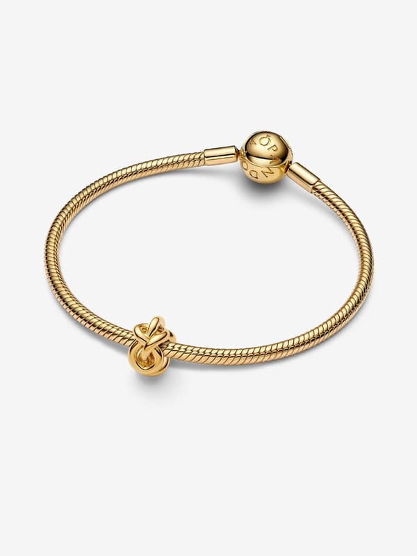 Pandora - Infinity Knot-charm - 14k guldbelægning