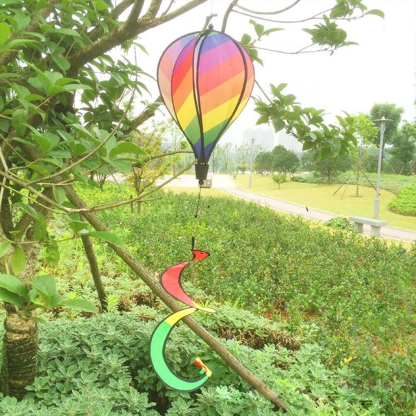 Regnbue varmluftballon vindstribe lysende roterende farverig
