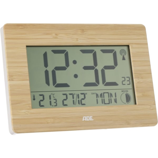 Radiostyrd digital klocka med DCF tidssignal, hölje med äkta bambu, LCD display, termometer, väckarklocka och kalender. Batteri ingår,