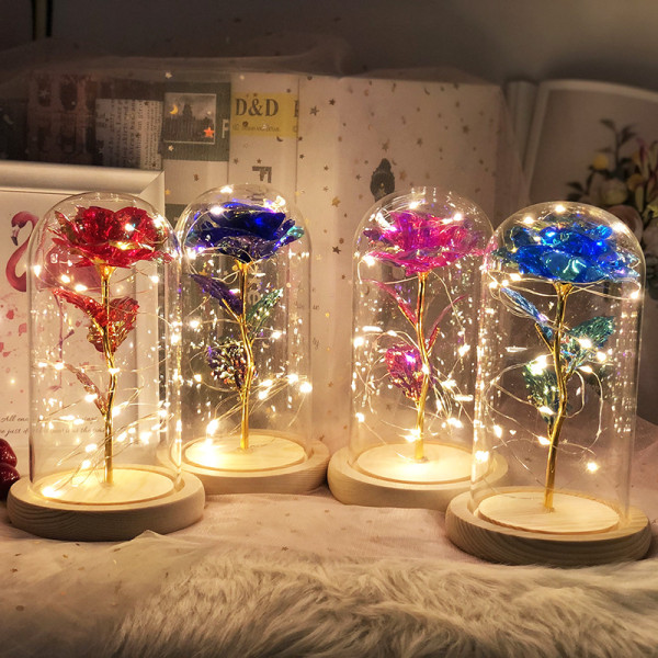 Skönheten och odjuret ros förtrollad blomma med LED-ljus i