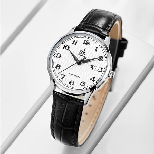 Analog kvartsklocka för kvinnor med läderarmband