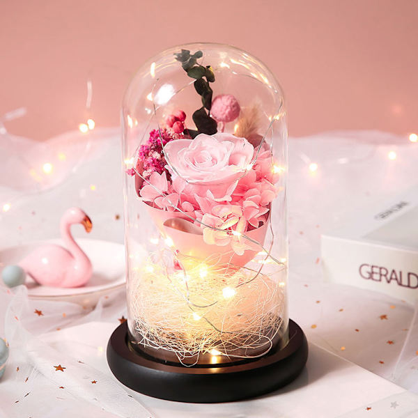 Kreativa blomsterglasprydnader led lysande rosbukett