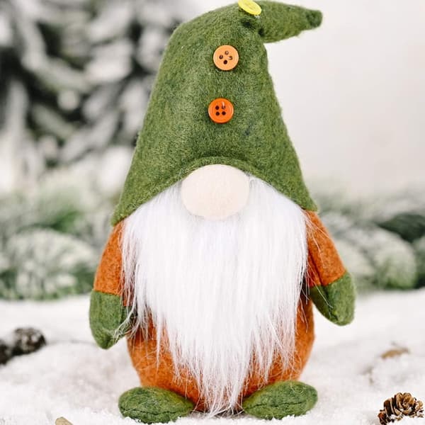 Juldocka stickad av fiberduk