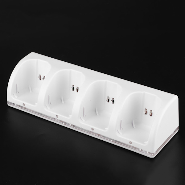 Valkoinen 4-in-1 latausasema laturi 4 kpl 2800mAh akkua Wii / Wii U -kaukosäätimiin 2800mAh akku