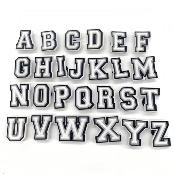 40 stk. sorte og hvide alfanumeriske sko-accessories til Croc Char