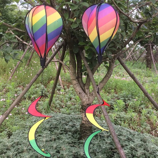 Regnbue varmluftballon vindstribe lysende roterende farverig