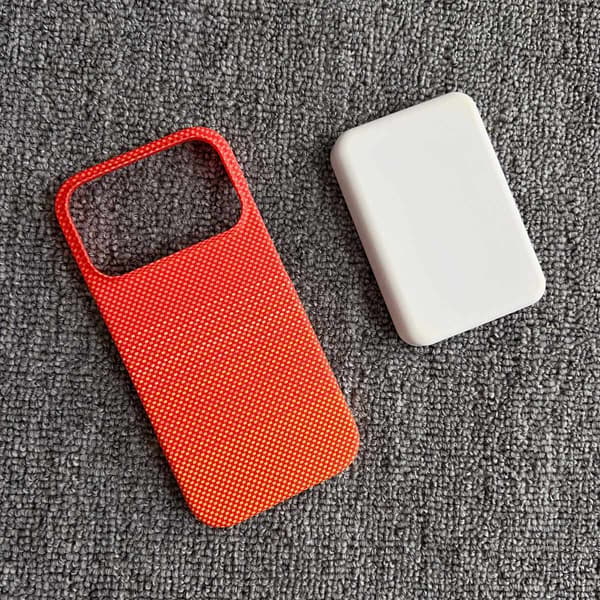 Fodral till iPhone 15 Pro Kolfibertextur Magnetisk Orange Noz33660