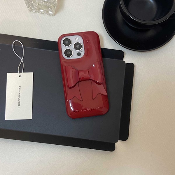 Kotelo iPhone 14 Prolle Punainen+Rusetti Retro nahkakuvio puolikotelo