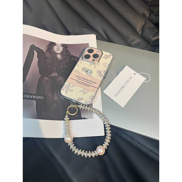 Etui til iPhone 13 Pro metalring galvanisering - rose + dobbelt skal perler snor temperament kamelia håndled læder tekstur