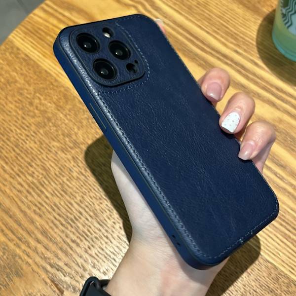 Fodral för iPhone 14 Plus Lädertextur Blå Noz31971
