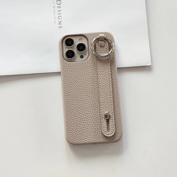 Etui til iPhone 13 abrikos Pebbled håndledsring stand
