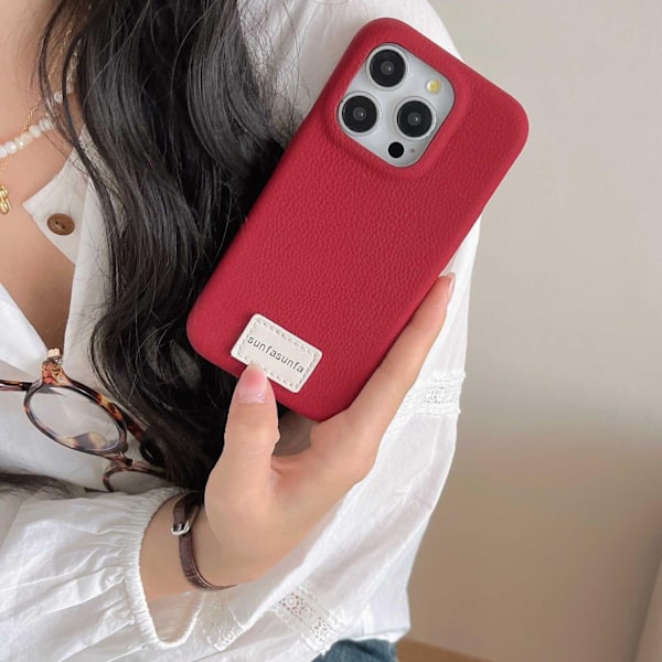 iPhone 16 Pro -kotelo punainen [yksittäinen kuori] nahkarakenne tavallinen kapea