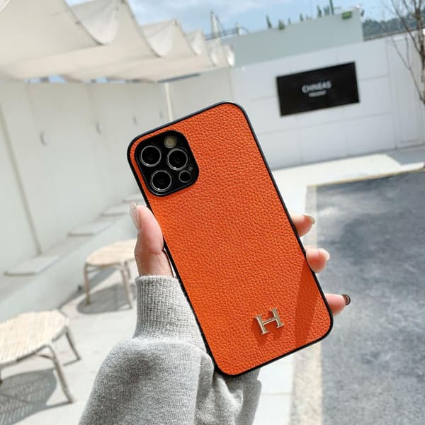 Etui til iPhone 15 oransje farge Pebbled Kortholder