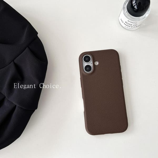 Kotelo iPhone 16:lle Tummanruskea Yksinkertainen nahka dopamiini