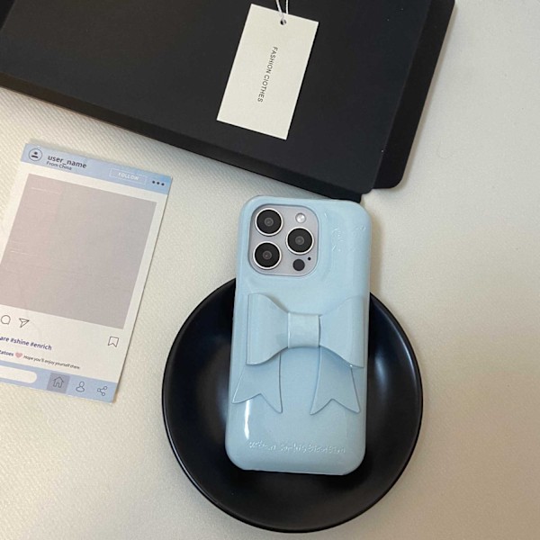 Fodral för iPhone 15 Pro Max Himmelsblå rosett Retro lädertextur halvtäckande