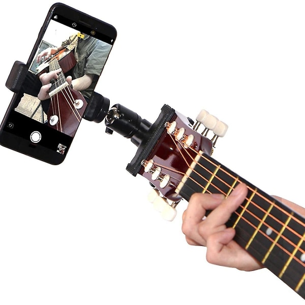 Nytt fäste för gitarrhörlurshållare som är kompatibelt med undervisningsvideo för direktsändning
