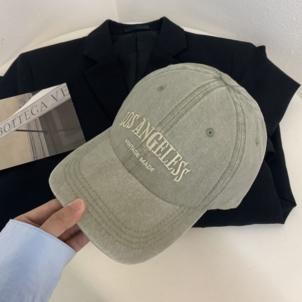 Hatt Kvinnors retro baseballkeps visar små facekhaki