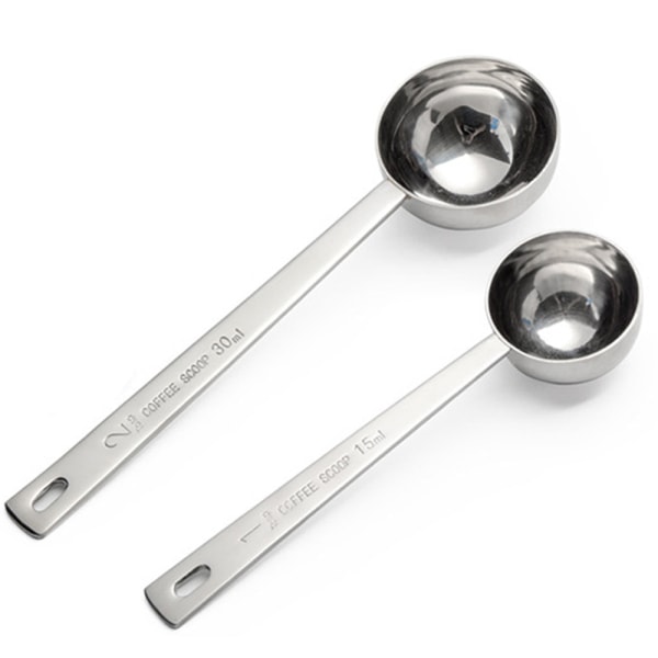 2 stk. kaffeske, spiseske måleske indeholder 1 spiseske (15 ml) og 2 spiseske (30 ml)