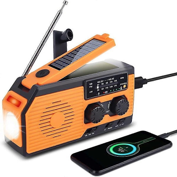 Käsikäyttöinen radio akulla, hätätarvikkeet retkeilyyn ja telttailuun