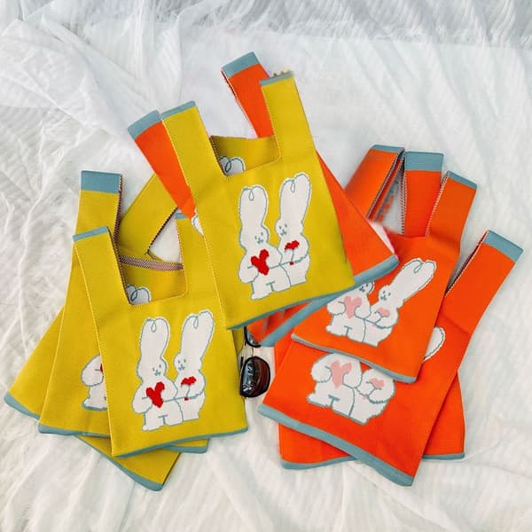 tickad handväska Knot handledsväska ORANGE orange S