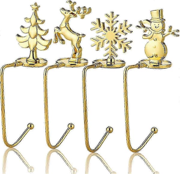 4 st julstrumphängare Mantel Eldstadsfästen Tomte Snögubbe Älg Träd