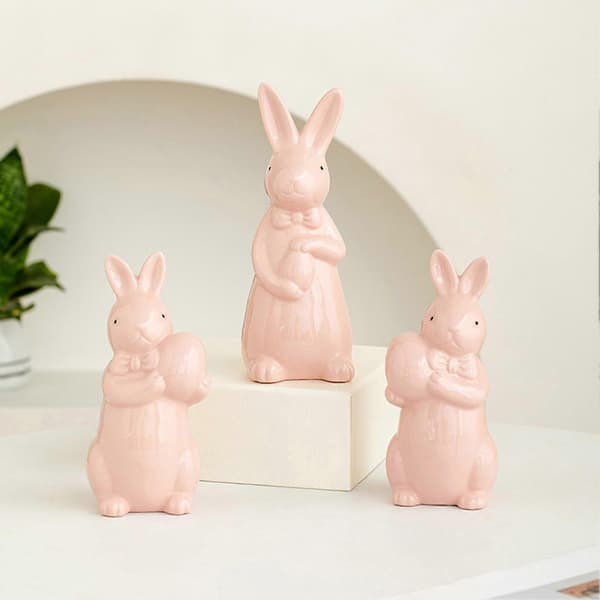 Keramisk påskeharestatue - Sløyfehare som holder eggdekor White A