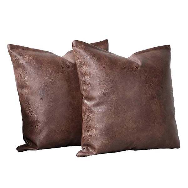 Sett med 2 dekorative putetrekk i imitert skinn for sofa og seng