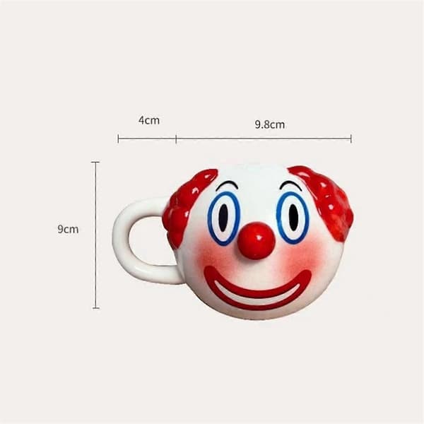 Klovneformet keramisk kaffekopp med hank