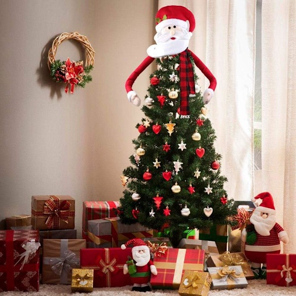 Suuri joulukuusen huippupäällyste Santa Claus -hattu pussilakanalla jouluun ja joulukuusiin
