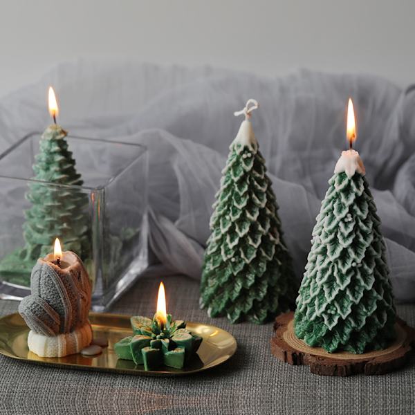 Två julstjärnor och nyårsgåvor med handgjorda doftande ljus