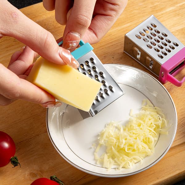 7×3.5cm Mini 4-sidig håndskjærer for frukt og grønnsaker, PP Pl