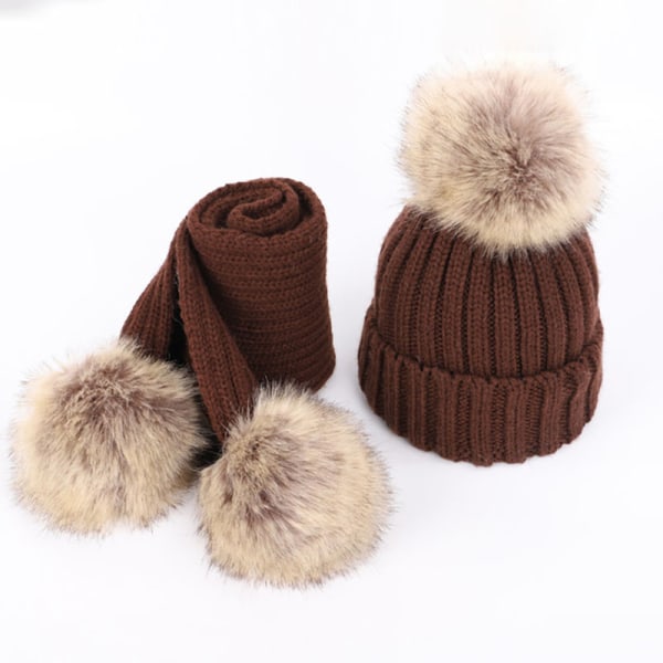 Spädbarns- och småbarnsmössa i ull, enfärgad, vintertwist med pompom