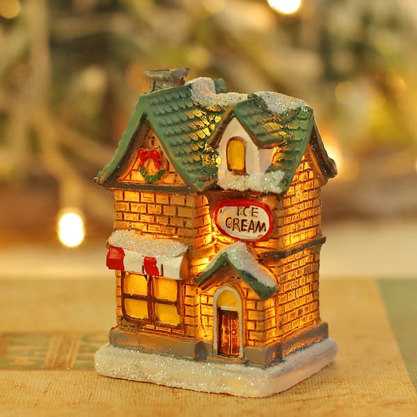Fyra julmotiv lysande snöhus prydnadsföremål Micro-landsc