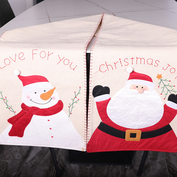 Ny juledekorasjon i non-woven stoff med brodert julenisse