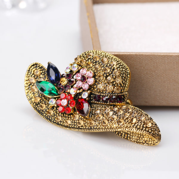 Snygg ny legering brosch, solhatt med diamanter antik guld brosch