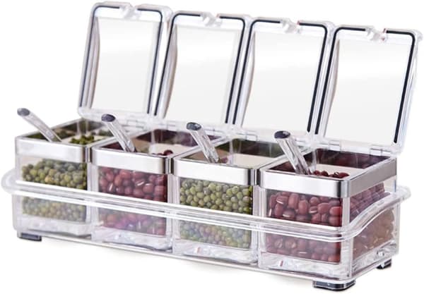 Gourmet-set med 4 akryl kryddbehållare och 4 serveringsskedar