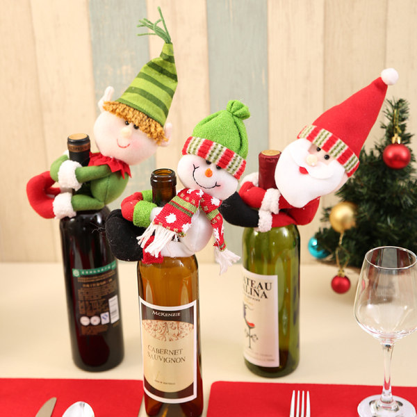 3 stycken juldekorationer jultomte, snögubbe, rött vin