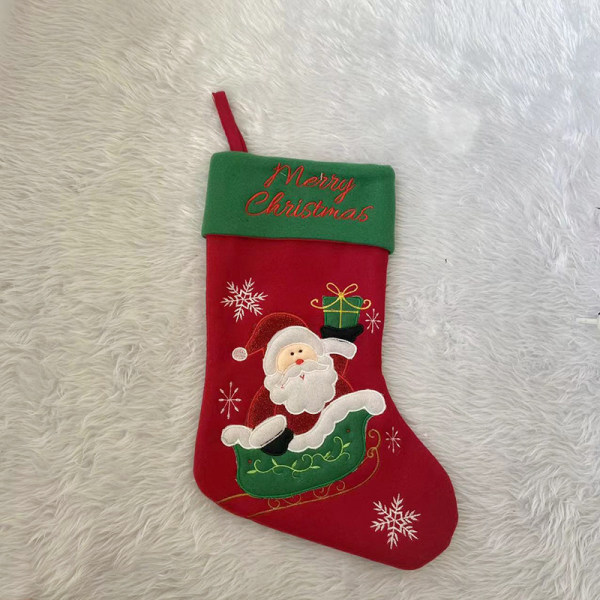 3 stycken julstrumpor julklapp jultecknad mönster