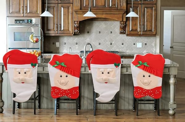Två set med julstolsöverdrag, matstolar, jul