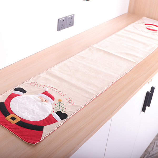 Ny juledekorasjon i non-woven stoff med brodert julenisse