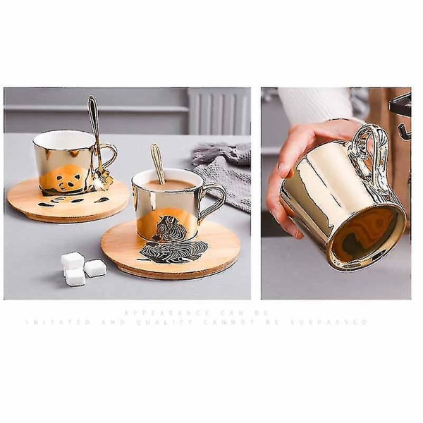 Gyllene spegelreflexkopp och kaffekopp av träfat (pa DXGHC