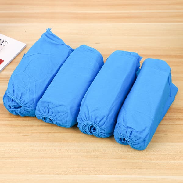 100 engångsskoöverdrag Hushållsförtjockade non-woven sko