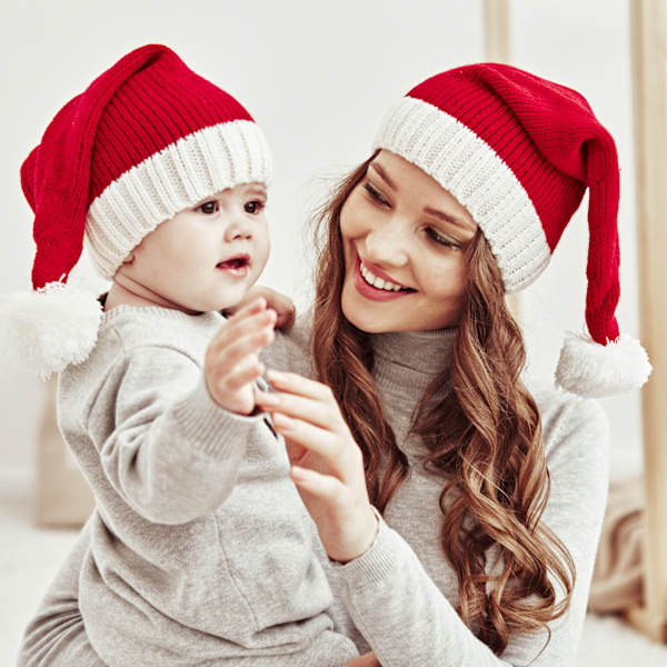 2-delt familie matchende julehue Vinter varm mor og baby
