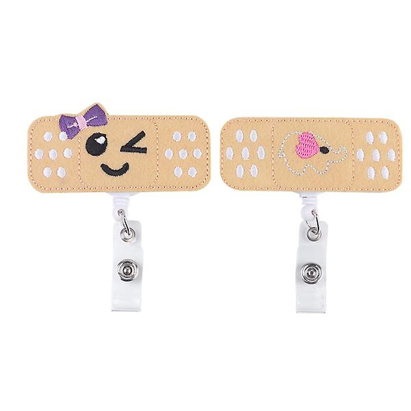 2 stk tilbagetrækkelige nøgleringe Elefant og smilende sløjfemønster Anti-tabte nøgleholdere Udtrækkelig nøglering Badge Reel Stålkabel Nøglering (hvid)