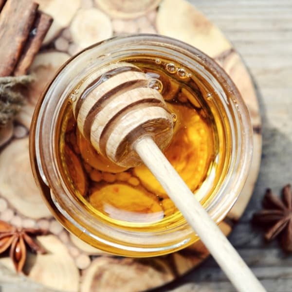 Sæt med 30 honningpinde i træ til dosering og opsamling af sirup og marmelade