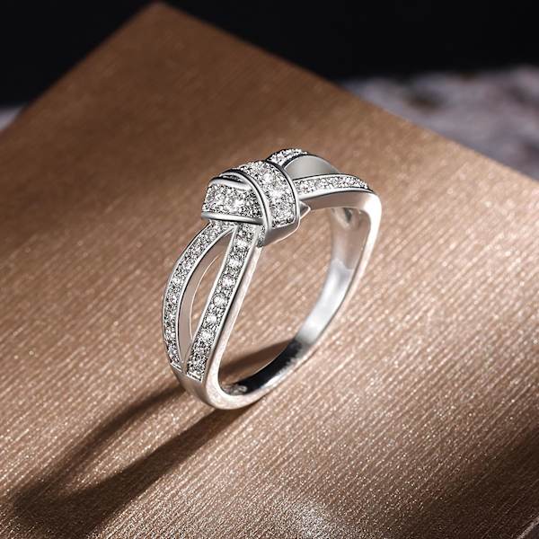 Kvinner Ring vridd bowknot form Rhinestone innlagt legering uthult fingerring til jubileum US 7