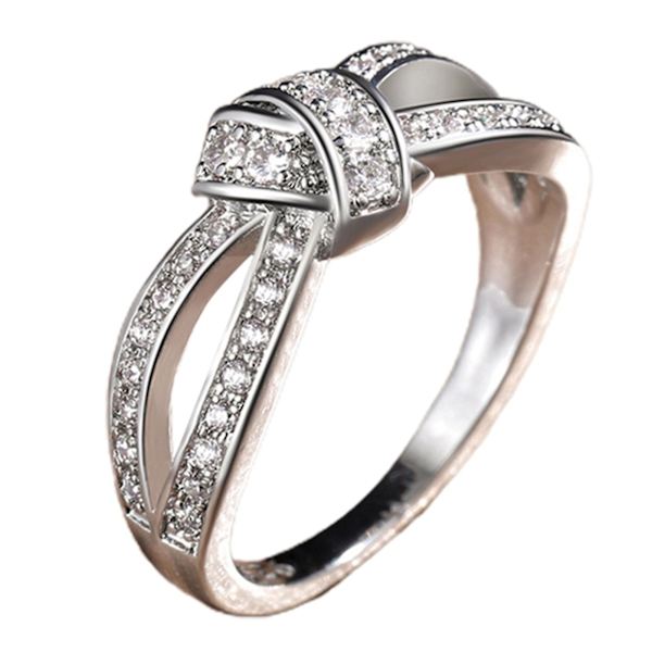 Damring Tvinnad pilbåge Form Rhinestone Inlagd Legering Ihålig Finger Ring För Jubileum US 9